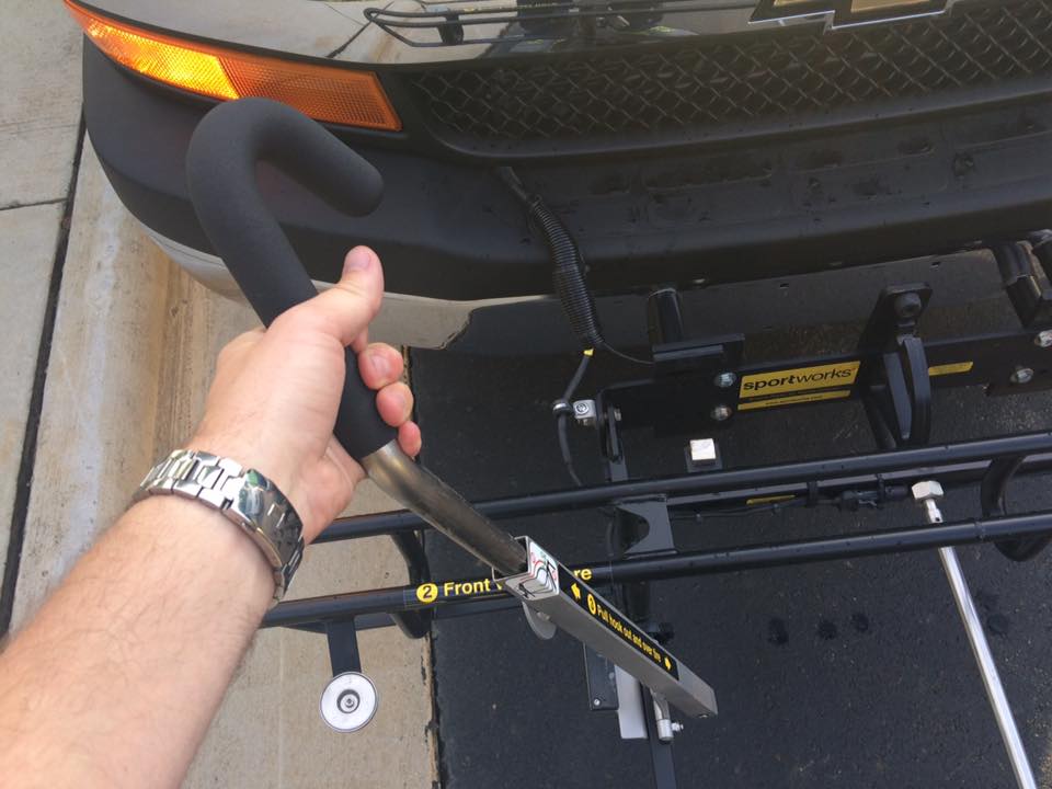 Bike Rack Spring-loaded bar to secure bike Bike Rack Spring-loaded bar to secure bike